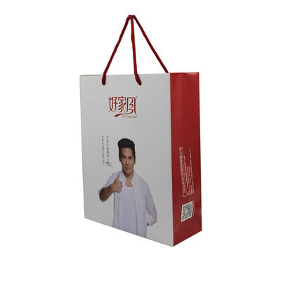 소상공인 로고 맞춤 로고와 검은 손잡이가있는 인쇄 된 흰색 종이 가방